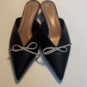 Maeve Black Pointed-Toe Mules with Ivory Bow